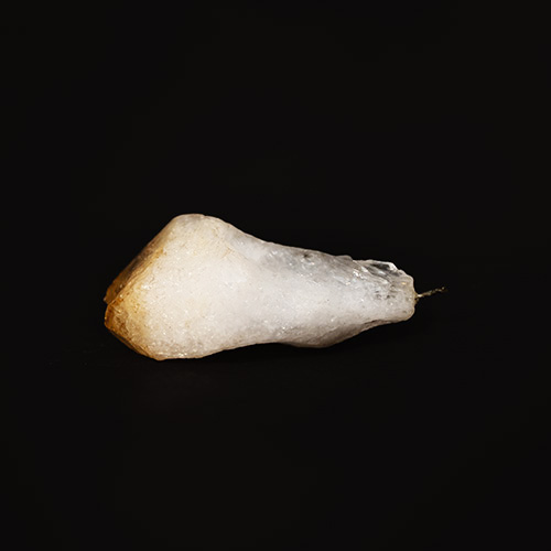 White clear pointed stone with orange at the top